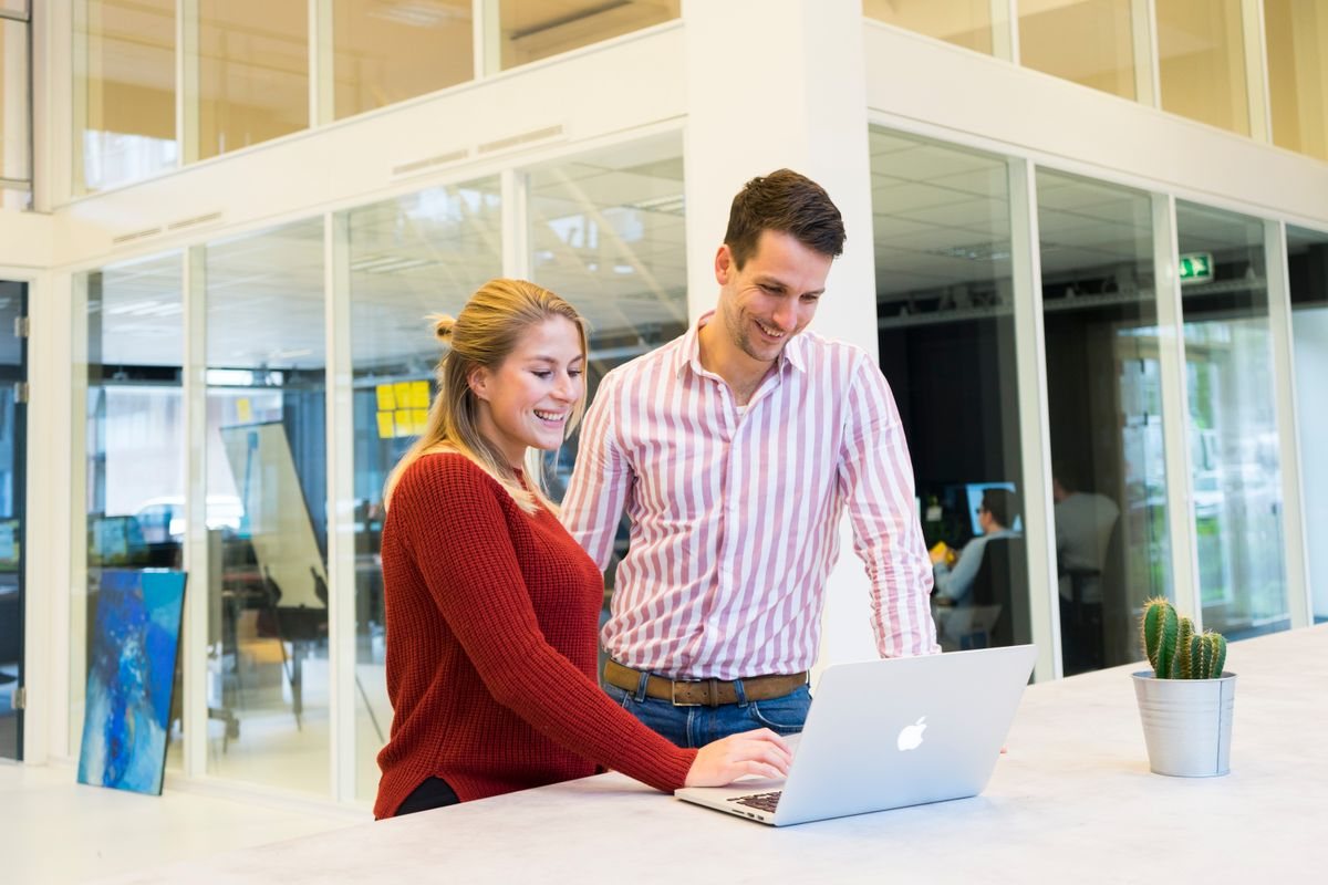 Two people working together